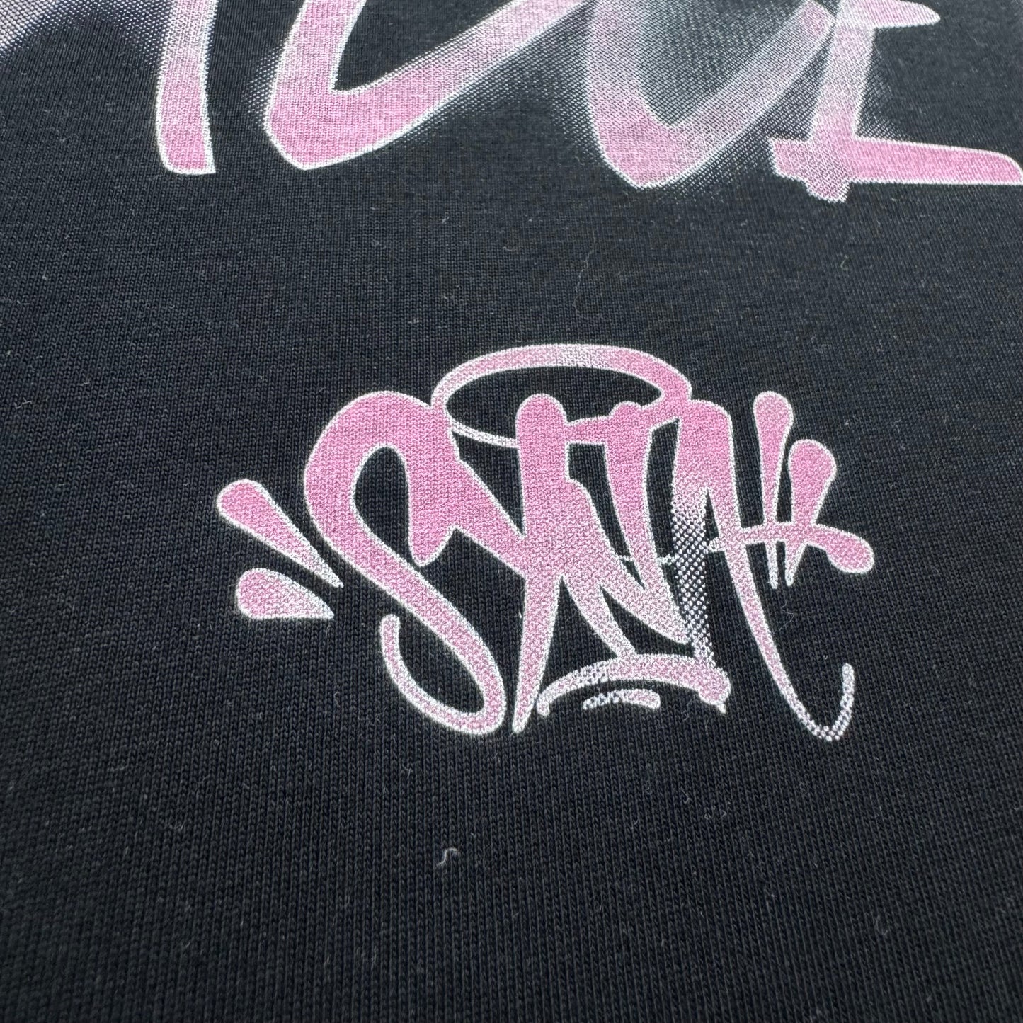 Camiseta Syna World