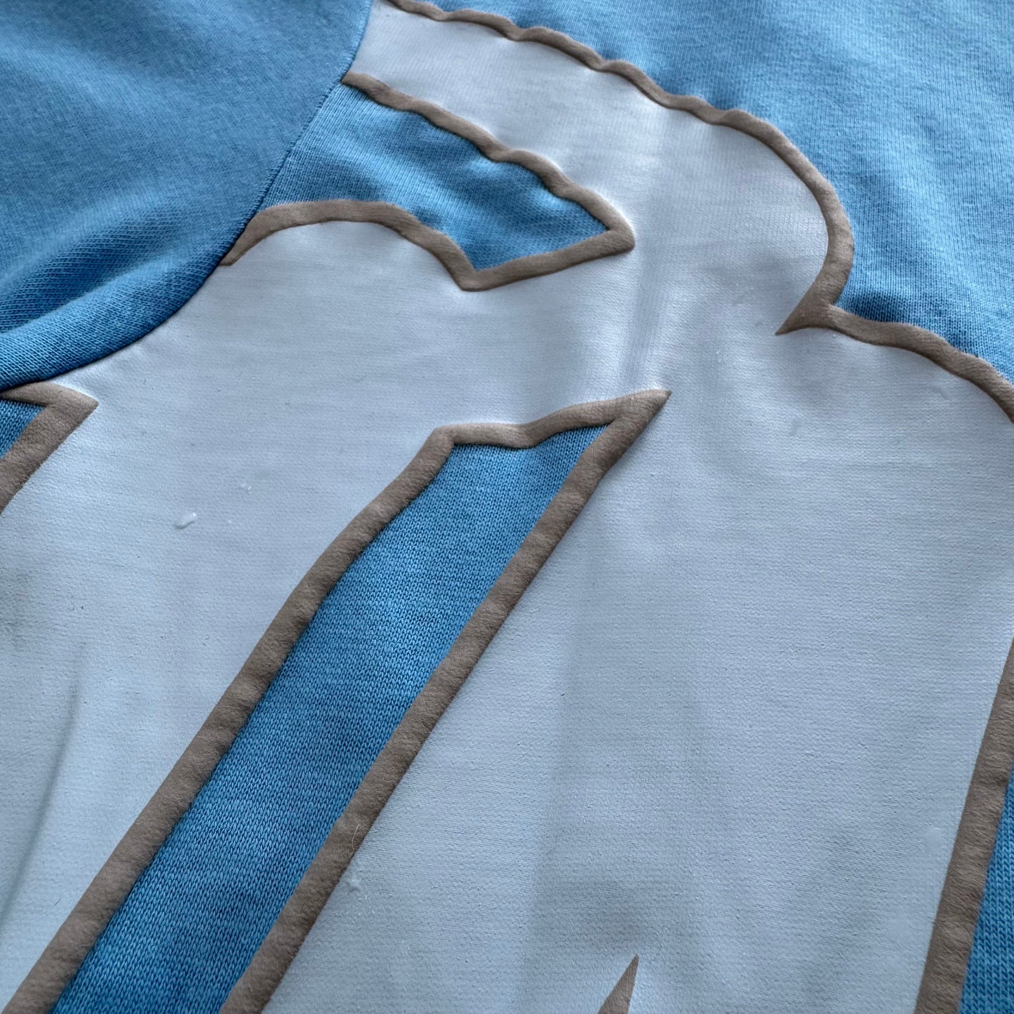 Camiseta Syna World