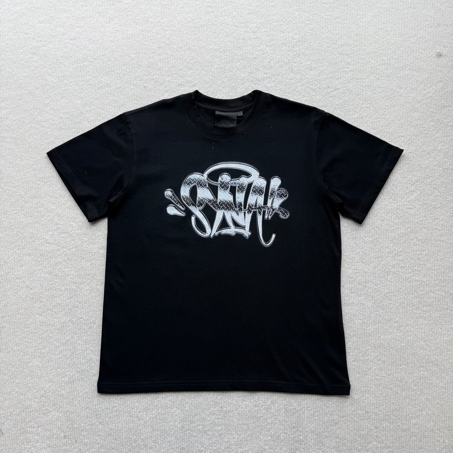 Camiseta Syna World
