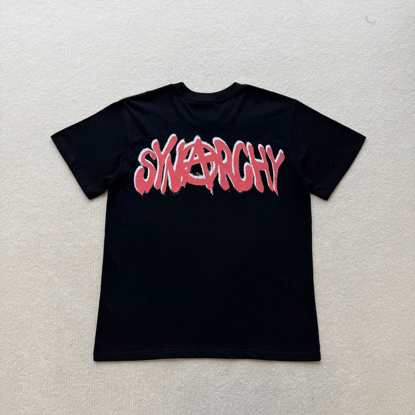 Camiseta Syna World