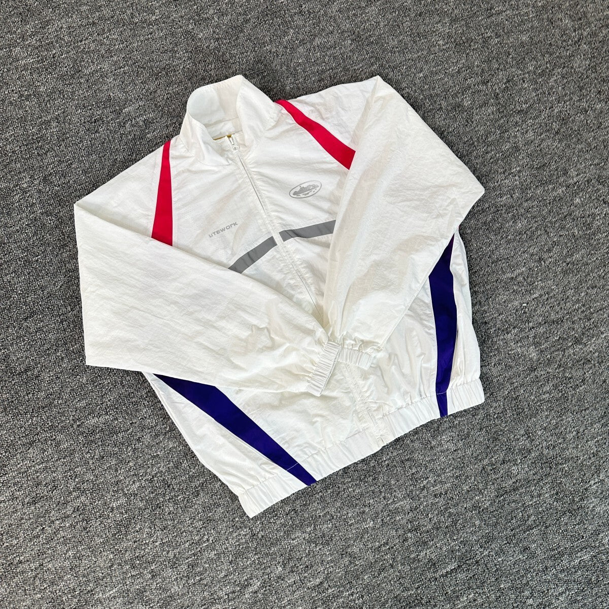 Corteiz Gradient Litework Jacket Cream