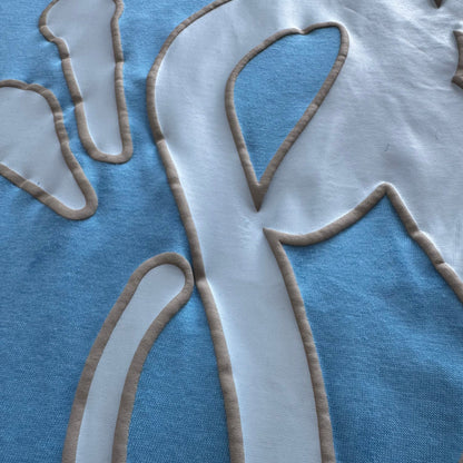 Camiseta Syna World