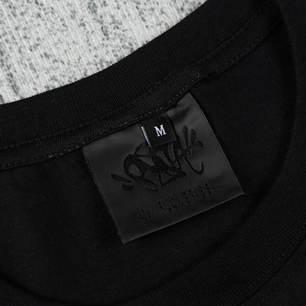 Camiseta Syna World
