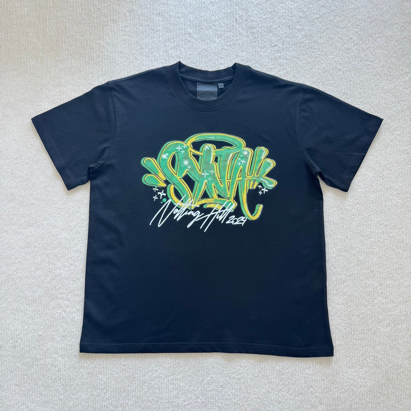 Camiseta Syna World