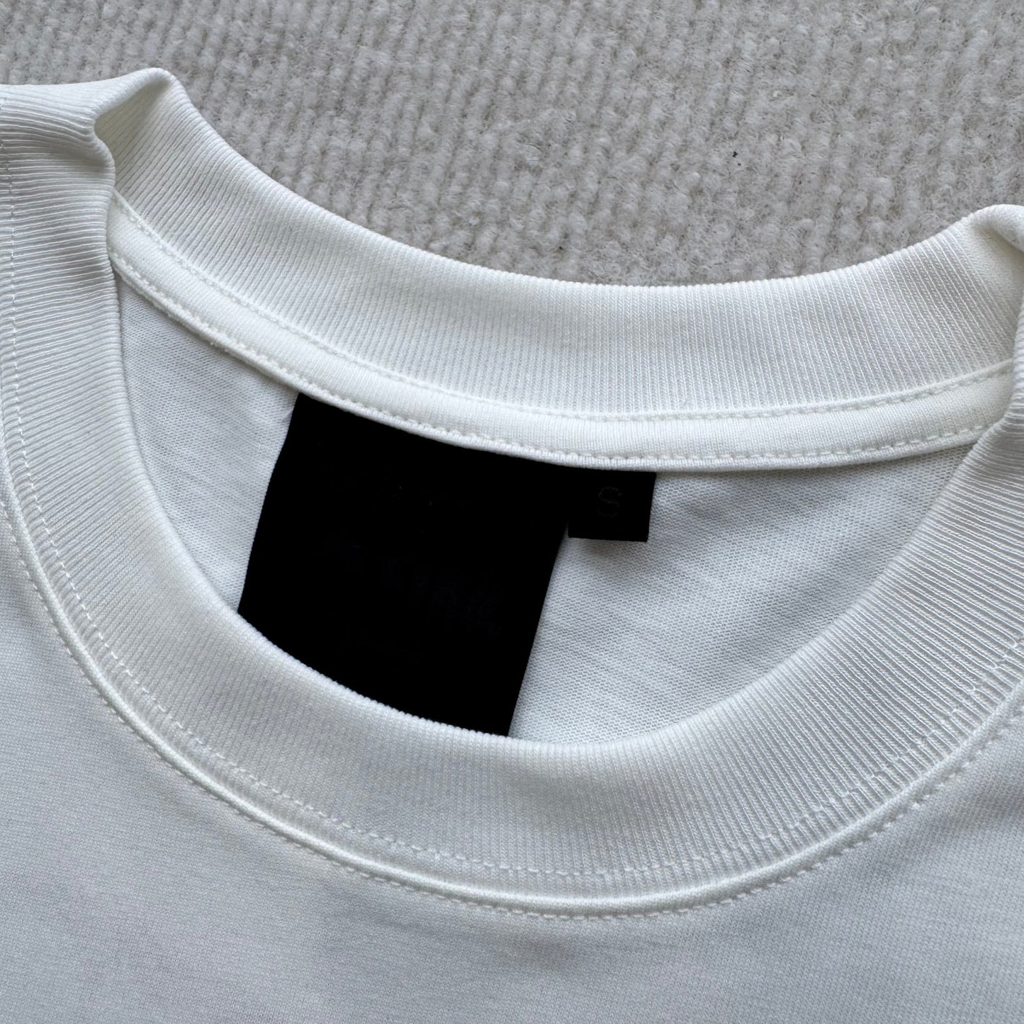 Camiseta Syna World