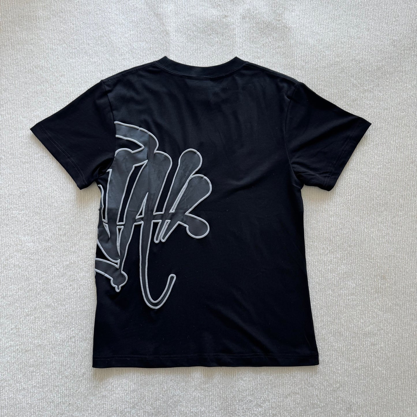 Camiseta Syna World